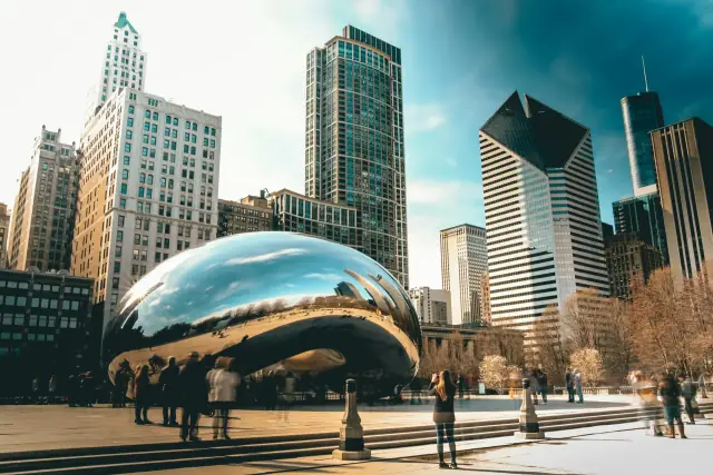 Cloud Gate sculpture and the Chicago skyline at Millennium Park